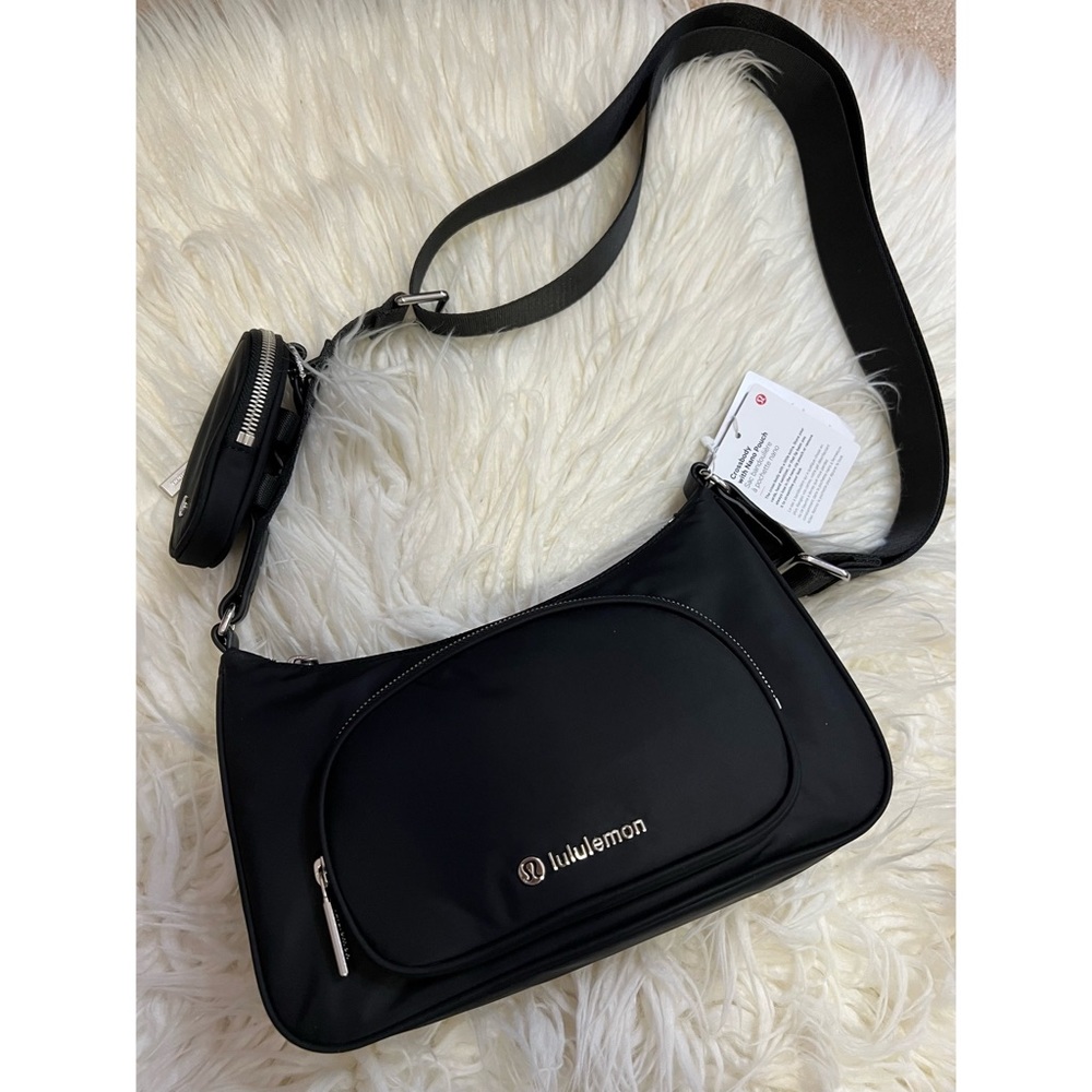 Lululemon crossbody with nano pouch in color black
RARE AND BRAND NEW - Picture 3 of 6